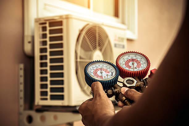 Professional Heat Pump Repair technician working in Elizabethtown, IN
